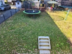 Garten mit Zugang zur Terrasse - Ihr Perfektes Eigenheim: modernes Reiheneckhaus mit Garten und Doppelstellplatz